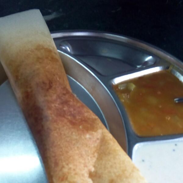 Crisp South Indian masala dosa served with sambar